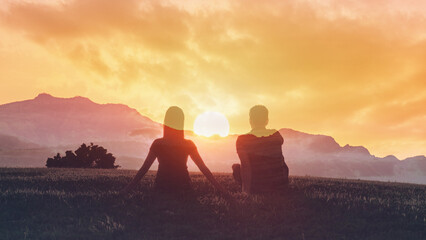 Peaceful Couple Relaxing at Sunset with Mountains in Double Exposure