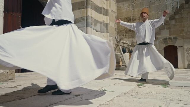 Slow motion of whirling Dervish dancers in traditional dress, Konya, Turkey
