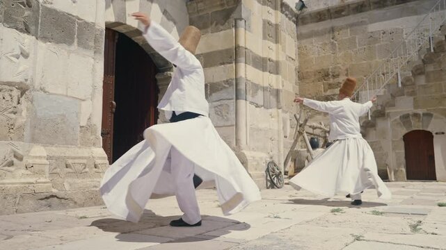 Whirling Dervish dancers in traditional dress, Konya, Turkey