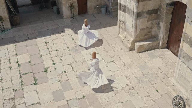 Sufi whirling Dervish dance in traditional dress, Konya, Turkey