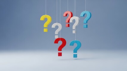 Hanging colorful question marks against a cool blue background