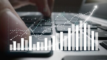 Close-up view of a computer keyboard with digital graphs and data visuals highlighting financial growth and analysis in a modern workspace environment. Copula - Powered by Adobe