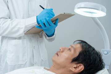 Specialist of hair check health of hair for Asian man, damaged hair, hair loss, thinning problem,...