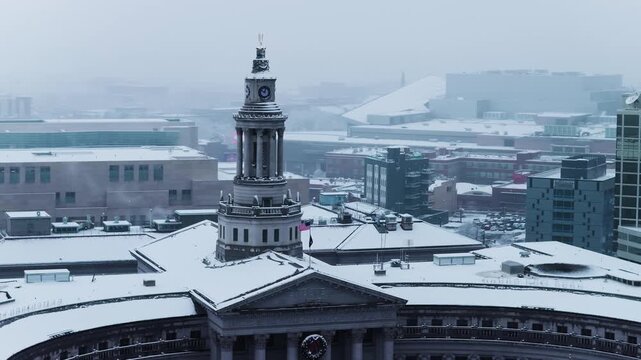 Denver Civic Center in snow, close up, aerial video, Denver, CO 4K