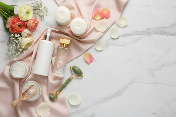 luxury self care skincare products arranged in minimal flat lay