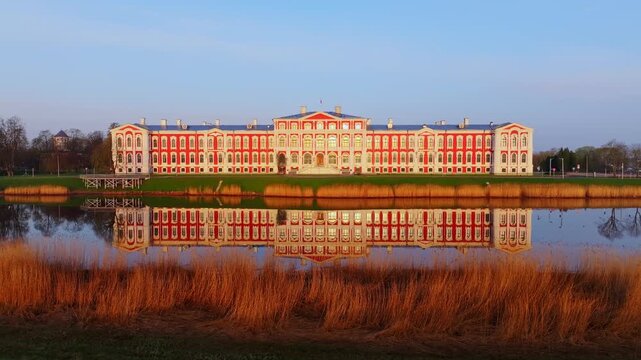 Early morning drone shot captures golden hour light on Jelgava Palace facade