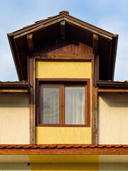 Small wooden window and roof
