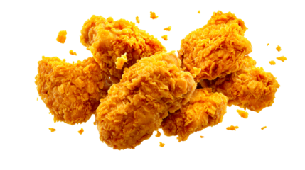 Pile of golden crispy fried chicken pieces with seasoned breading scattered in a dynamic composition perfect for food advertising and menu displays