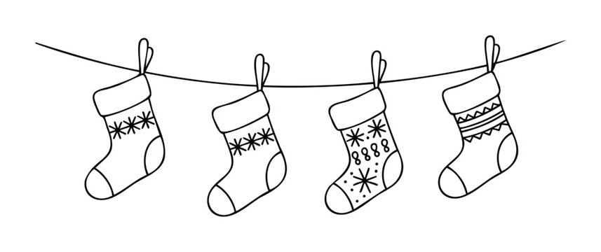 Christmas stockings with festive designs hanging on a string, perfect for holiday greetings, winter celebrations, and seasonal decorations.
