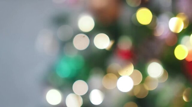 Beautiful defocused blurred Christmas tree lights bokeh for Christmas festive background holiday