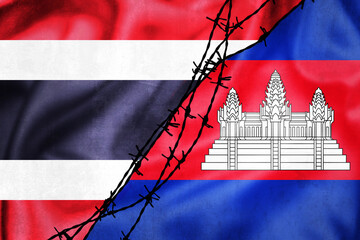 Grunge flags of Thailand and Cambodia divided by barb wire illustration
