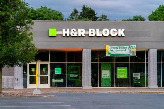 Rome, NY - Jul 17, 2025: Night view of H&R Block, H&R is a multinational tax preparation company with 12,000+ retail offices worldwide. Founded in 1955 by brothers Henry and Richard Bloch