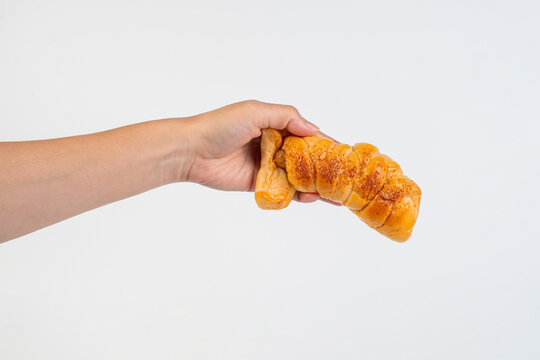 Baked bread stuffed with chicken sausage and hamd on white background