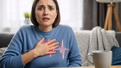 Woman suffering from chest pain with projected electrocardiogram wave. Heart attack, cardiac arrest, disease concept. Health care, medical application.