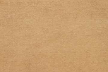 Brown cardboard sheet abstract background, texture of sepia color kraft paper with vintage pattern for design art work.