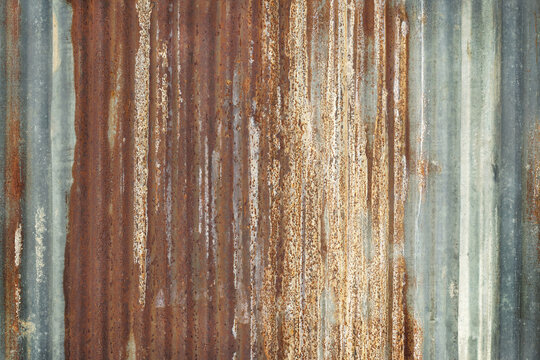 Old zinc wall texture background, rusty on galvanized metal panel sheeting.