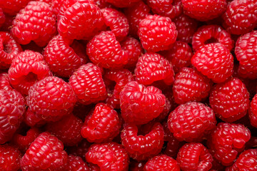 Fresh ripe raspberries as background, top view