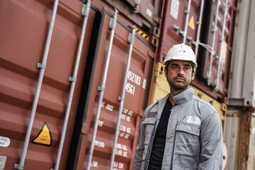 Man logistics workers use tablet computer with container background	