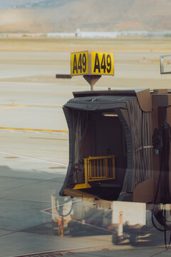 A jet bridge extends toward the runway.