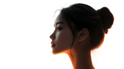 Silhouette of woman in soft dark lighting
