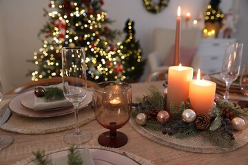 Festive table setting with Christmas decor indoors, closeup