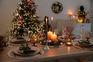 Festive table setting with Christmas decor indoors, closeup