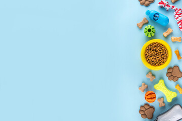 Obraz premium Flat lay composition with food, snacks, toys and accessories for dog