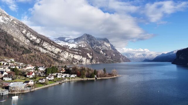 aerial view of walensee and surrounding alpine villages in switzerland