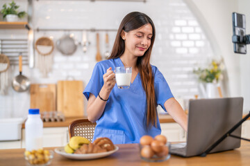 Woman nutritionist healthy food content creator live streaming with breakfast, milk, banana, bread...