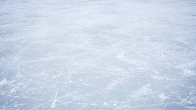 Frozen expanse: A textured ice surface with visible skate marks and patterns