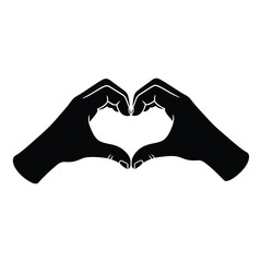 Fototapeta premium Hands forming a heart silhouette gesture