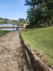 stone path in a park near a lake