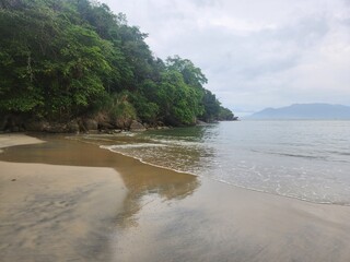 A sunny day at the beach in Ilha bela, Brazil.