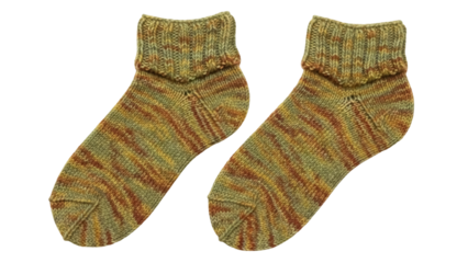 Isolated pair of handmade warm socks in natural wool pattern with turn-down cuff, fashion item