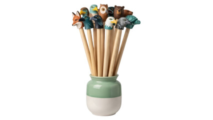 Isolated bunch of pencils in ceramic vase featuring carved animal head, nature concept