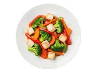 Isolated plate of tofu stir fry with broccoli, carrots, bell pepper and healthy food