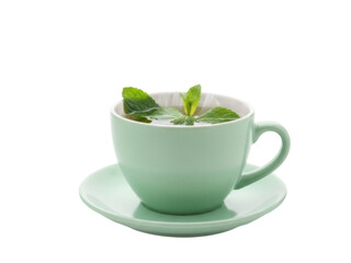 Isolated teacup and saucer with mint tea, calming herbal drink for relaxation and wellness