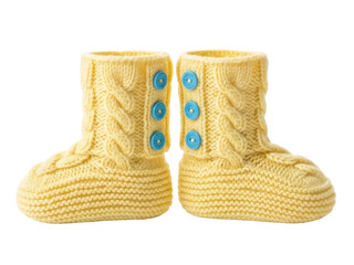Isolated knitted baby booties, yellow wool infant shoes, handmade footwear with bright blue buttons