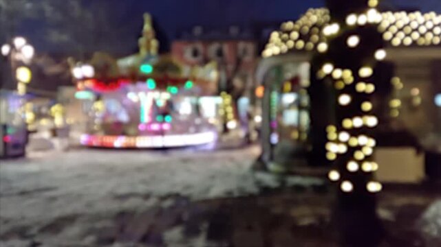 Bokeh abstract for carousel ride in amusement park. Blurred background for Christmas and New Year, 4k