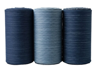 Isolated set of rolls of denim fabric in various shades of blue for crafts and sewing work