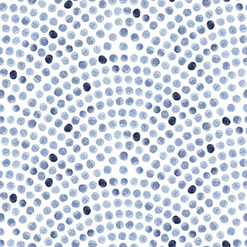 Seamless watercolor dotted circle pattern. Hand drawn indigo dots in concentric style. Soft textured look with organic variation. Perfect for wrapping, textiles and decor.