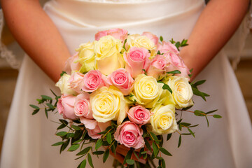Bride Holding Pastel Pink And Cream Rose Bouquet. Wedding Floral Arrangement Detail Romantic Moment