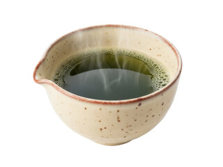 Isolated matcha green tea in a bowl with spout and a brown rim, ready to pour and serve