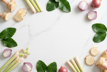 Fresh Thai food ingredients frame with galangal lemongrass kaffir lime leaves and red shallots on white marble background top view flat lay concept for tom yum spicy soup recipe