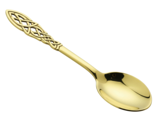 Isolated antique golden spoon with ornate Celtic knot design for vintage eating decor