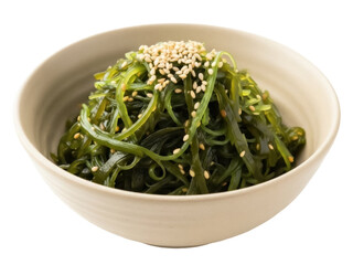 Isolated bowl of seaweed salad garnished with toasted sesame seeds in studio light © Eva