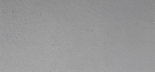 Clean light gray wall texture featuring a fine and uniform grain pattern. Ideal for minimal backgrounds, architectural mockups, design overlays, and neutral visual environments.