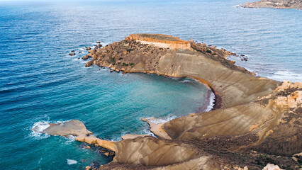 Beautiful coastal scenery of Ghajn Tuffieha Bay in Malta, offering travel and nature concepts.