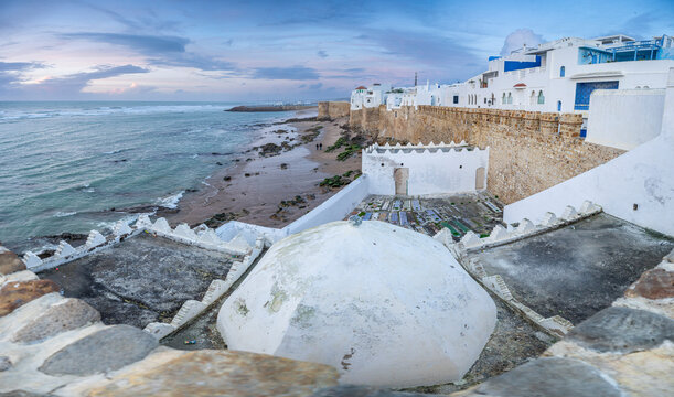 Cemetery and Mausoleum of Sidi Ahmed El Mansur, evening lights at Caraquia Viewpoint, Asilah, Morocco, North Africa