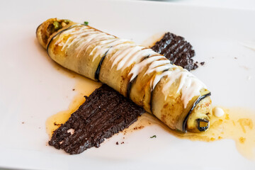 Eggplant cannelloni stuffed with seafood on olive and honey paste, Tetouan, Morocco, North Africa